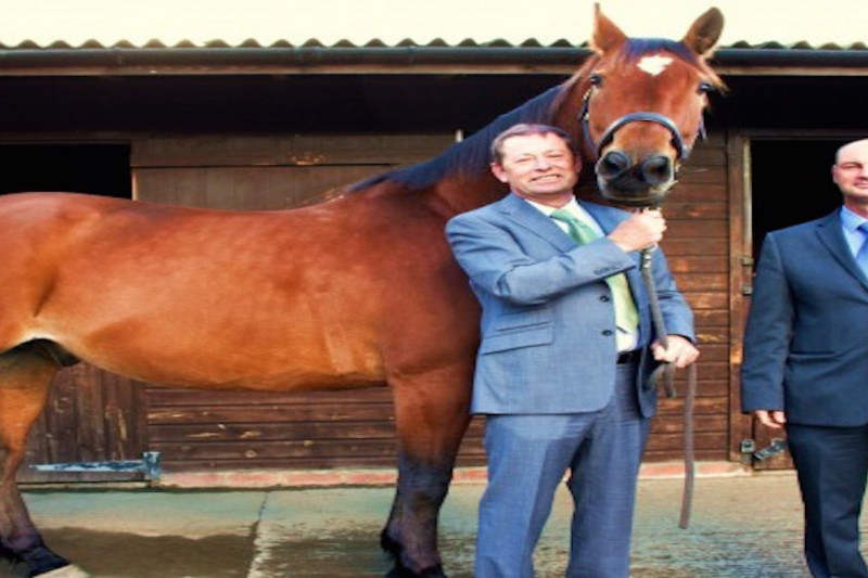 Barry Sexton with his horse Piri and Jeff Seed from J W Wood Estate Agents at the stables